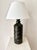 Pair of stylish vintage Swedish stoneware table lamp foots in deep green glaze, with geometric relief designed and...