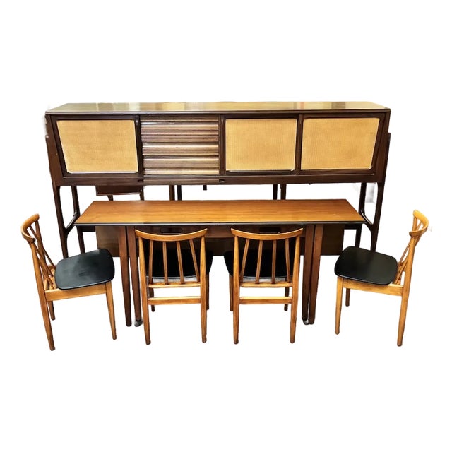 Iconic European Mid Century Modern Teak & Wicker Nesting Dining Suite W/ Credenza, Dining Table & Four Chairs c.1960 For Sale