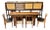 Iconic European Mid Century Modern Teak & Wicker Nesting Dining Suite W/ Credenza, Dining Table & Four Chairs c.1960 For Sale