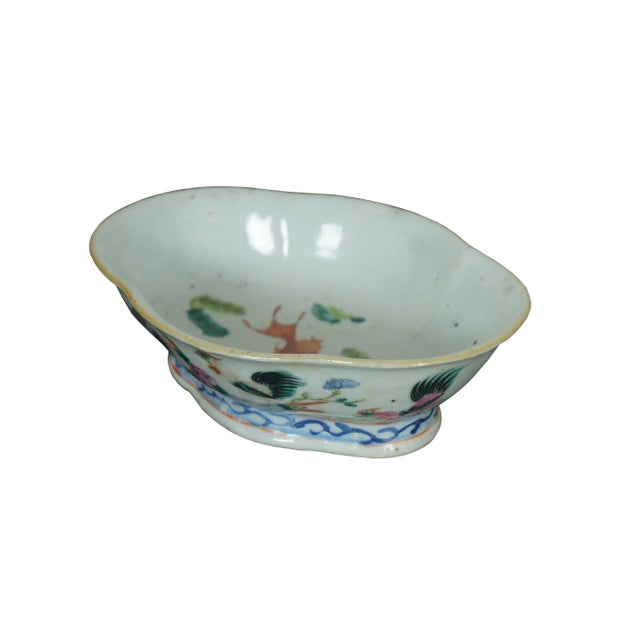 An impressive mid 19th century Chinese Export Bowl. Made from porcelain with polychrome rooster and hen design. Features a...