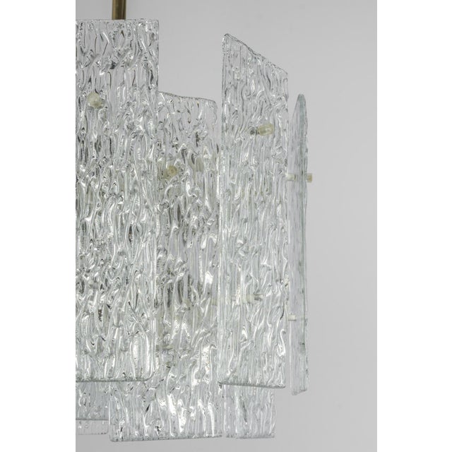 Stunning large murano glass chandelier by kalmar, 1960s three tiers gather structured glasses, beautifully refracting the...