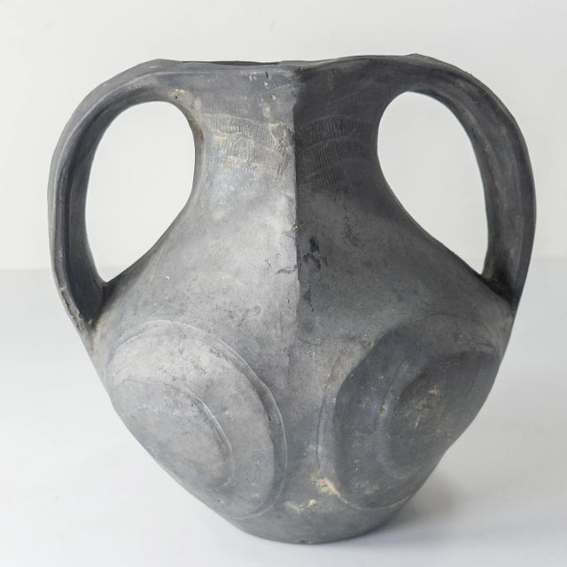 We are selling this early Chinese Han Dynasty Sichuan black glazed amphora. This vase has traditional form with very...
