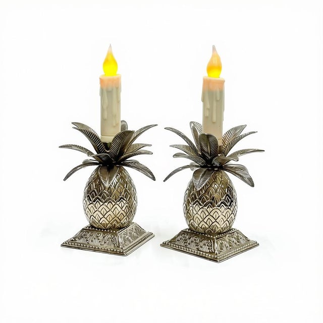 Pair of Vintage Silver-Plated Pineapple Candlesticks Add a touch of timeless elegance to your home with this charming pair...