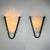 Vintage late 20th century wall sconces with frosted glass shades and hammered iron frames in a blackened finish. Clean,...