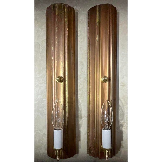 One of the kind striking pair of custom-crafted wall sconces by the artist Joseph Malekan. Masterfully reimagined from...