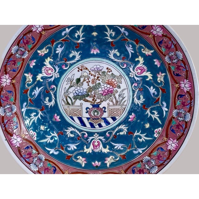 Vintage hand-painted bowl, “”Macau Flowers” made exclusively for Ethan Allen in the late 1970s. The plate is decorated...