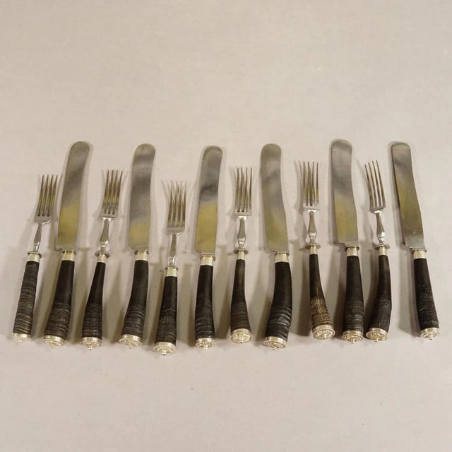 Antique Set of Rustic Hunters Cutlery with Chamois Horn Handles A rustic set of six knives and forks. The handles are made...
