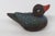 This highly charming Miniature Duck Figurine is made of ceramic. This darling duck presents a feathered colorway of blue...
