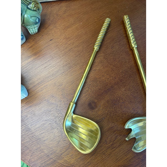 It’s not too late to send your father a gift for Father’s Day. Or just for the avid golfer, here is a set of brass golf...