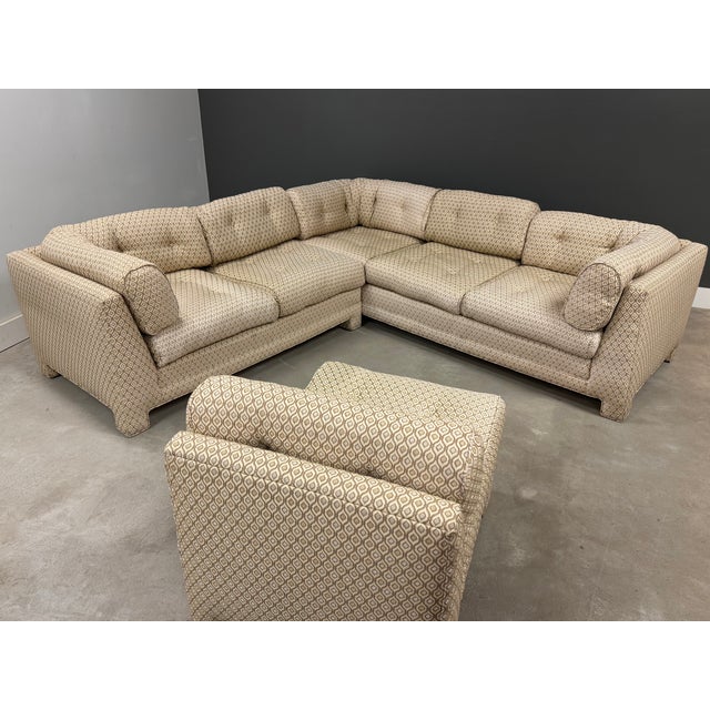 A three section L shaped modular sofa in the style of Milo Baughman Parson sofa. Use in different orientations to fit your...