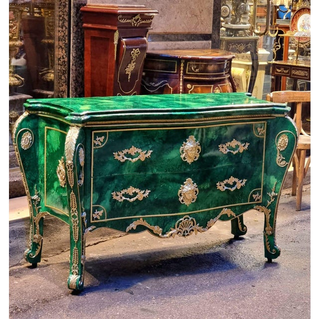 Bring bold elegance and timeless European sophistication into your interior with this grand Louis XV-style commode,...