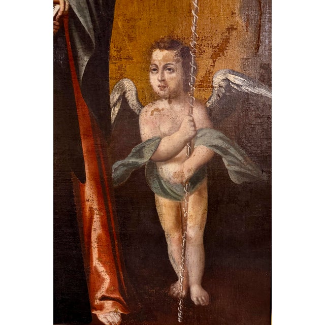 spanish colonial painting relined and reframed