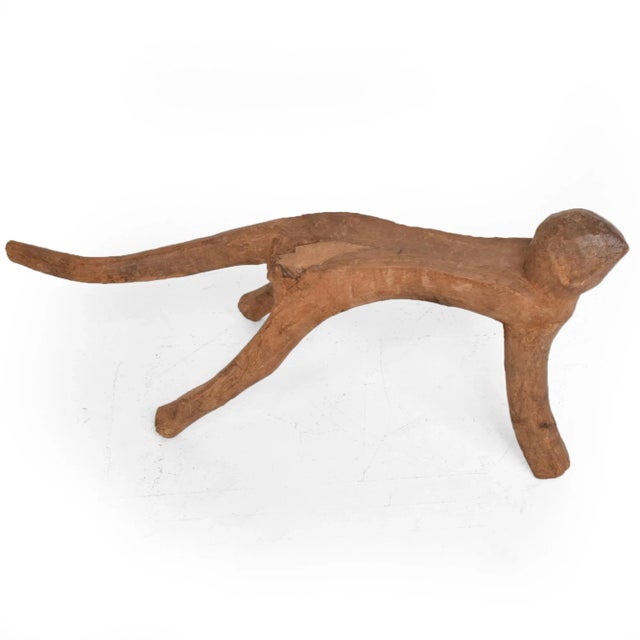 AMBIANIC presents 1970s Sculptural Milking Stool style Pierre Jeanneret Hand carved wood Unmarked 11.5 L X 25 D x 15 T....