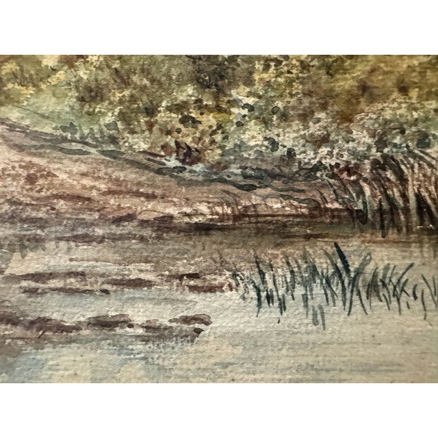 Original watercolor on textured paper attributed to Frank Henry Mason, depicting a quiet marsh or wetland landscape with...