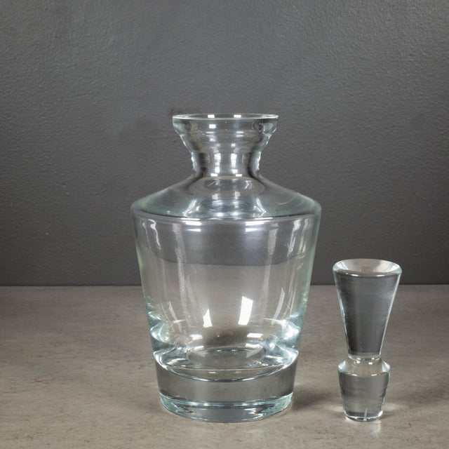 ABOUT Elevate your barware collection with this Block crystal decanter, which is a high-quality, handcrafted item renowned...