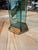 Elegant pair of modernist table lamps attributed to Fontana Arte, featuring sculptural brass frames combined with striking...