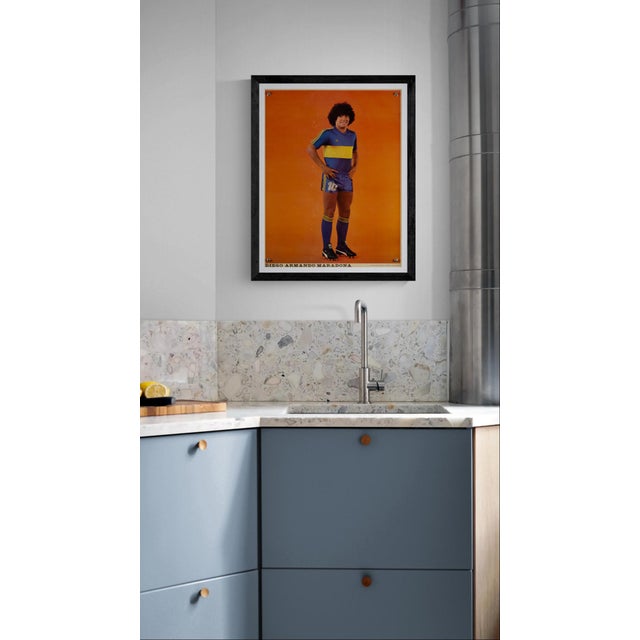 The Piece An original vintage sports poster celebrating the legendary footballer Diego Armando Maradona in 1981. This...