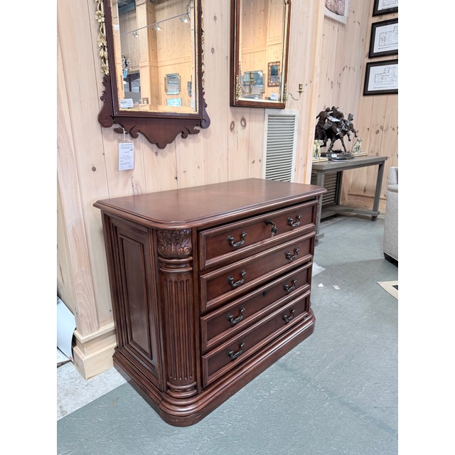 A beautifully crafted Hooker Furniture Seven Seas lateral filing cabinet that seamlessly blends executive functionality...