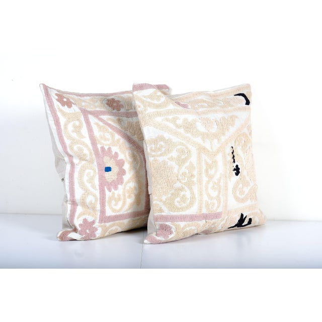Suzani Cushion Cover - A Pair Elevate your home decor with our Turkish Suzani Pillow Cover, featuring exquisite vintage...