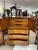 Up for sale is a Mid Century Modern Collector's dream! This is a Highboy Dresser that is part of a matching 5 piece Walnut...