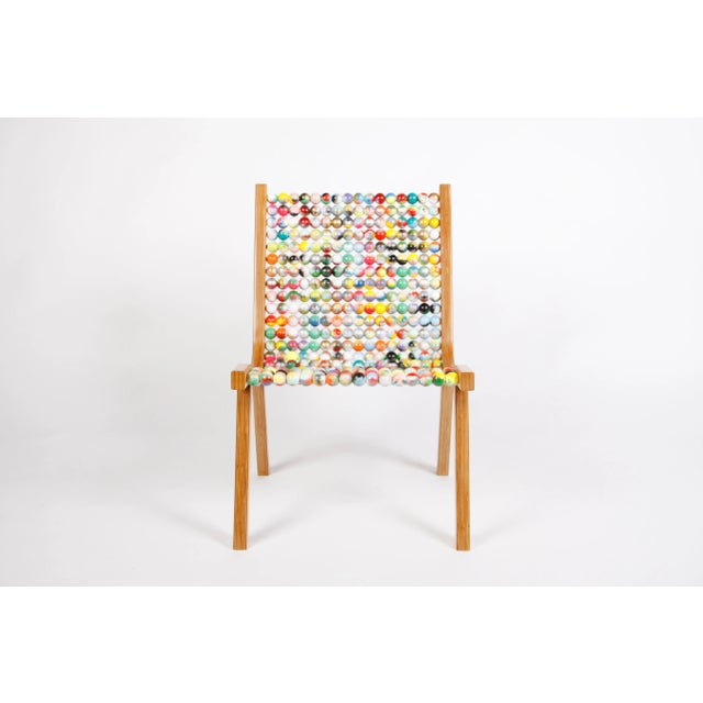 o432 is a chair that combines aesthetic, comfort and well-being. The back and seat are formed by 432 wooden spheres,...