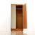 This vintage mid-century armoire was produced by Elliots of Newbury during the 1960s. Made from teak the front hinged door...