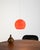 Glossy orange plastic spherical diffuser with a Space Age design. Scandinavian production from the 1960s. This ceiling...