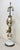This large antique mercury glass, opaline glass, and brass seltzer dispenser electrified table lamp is a unique and...