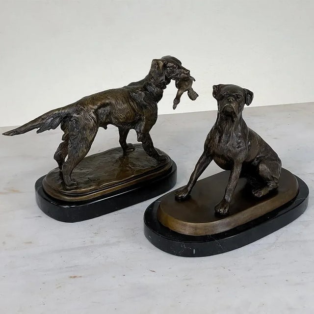 Antique Bronze Statue of Dog on Black Marble Base depicts man's best friend in a classic pointer pose, complete with a...