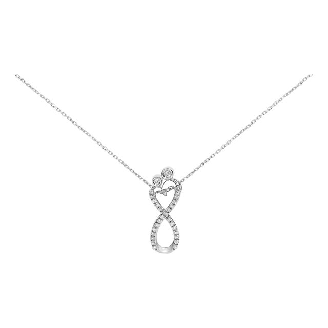 Sterling Silver 1/4 Cttw Diamond Infinity Motif Pendant Necklace For Sale