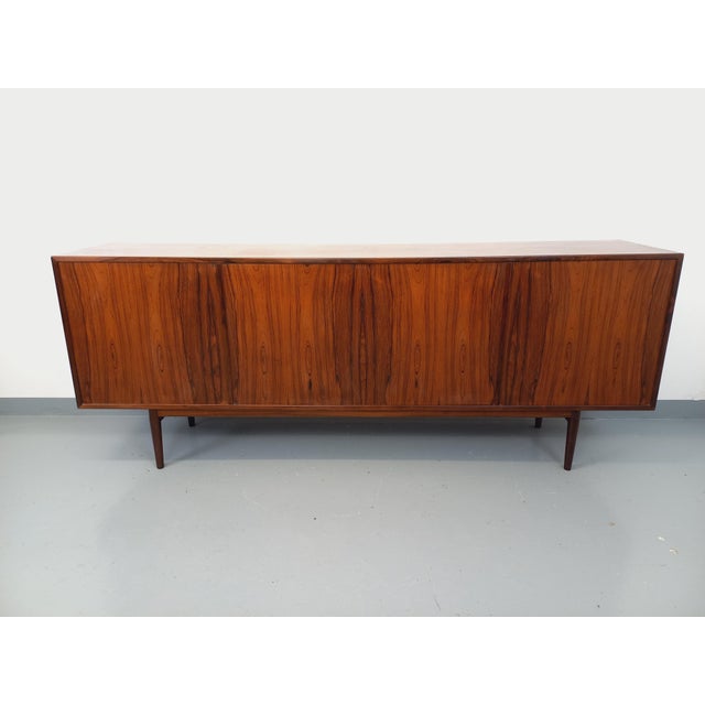 Vintage Scandinavian low sideboard from the 1960s, in rosewood, attributed to the Danish designer Arne Vodder, model...