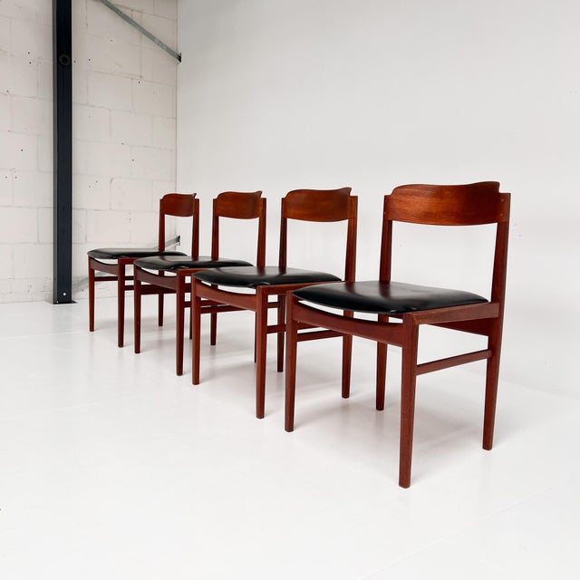 Set of 4 charming teak dining chairs from Denmark, 1960s. The chairs are attributed to Henning Kjaernulf for Korup...