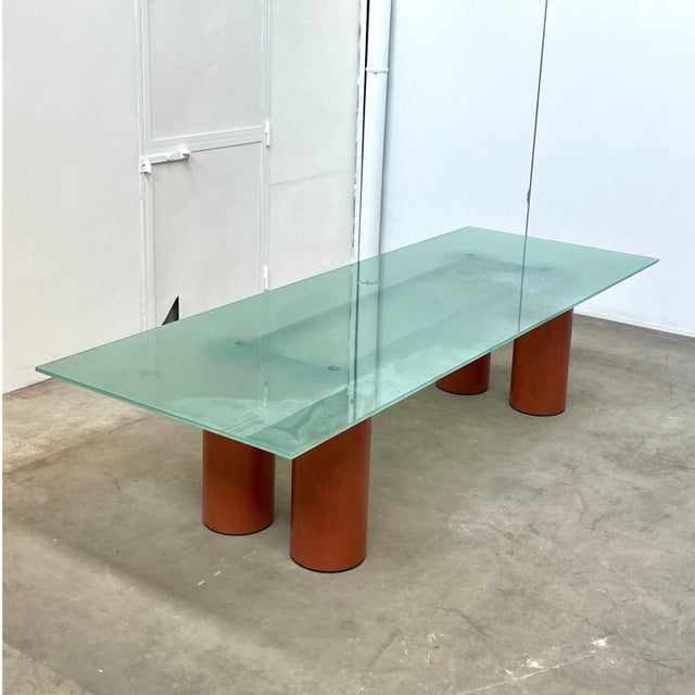 An iconic dining or reception table, designed in 1980 by the legendary duo Lella & Massimo Vignelli for the Italian...