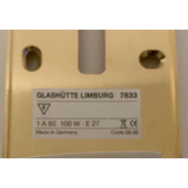 Set of 3 Vintage Limburg sconces, featuring a gilded brass base, conical shaped glass shades. Very good condition...