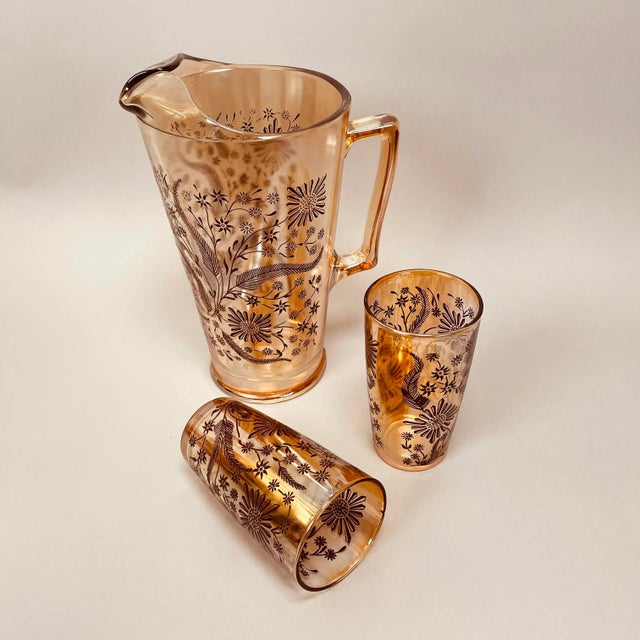 Beautiful example of swanky mid-century iridescent carnival glass design. Pitcher has some substantial weight and rim...