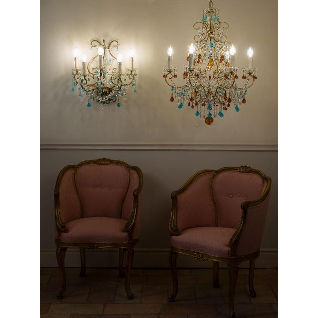 Vintage five-light Florentine wall lamp in wrought iron with colorful Murano glass drop pendants. The wrought iron frame...