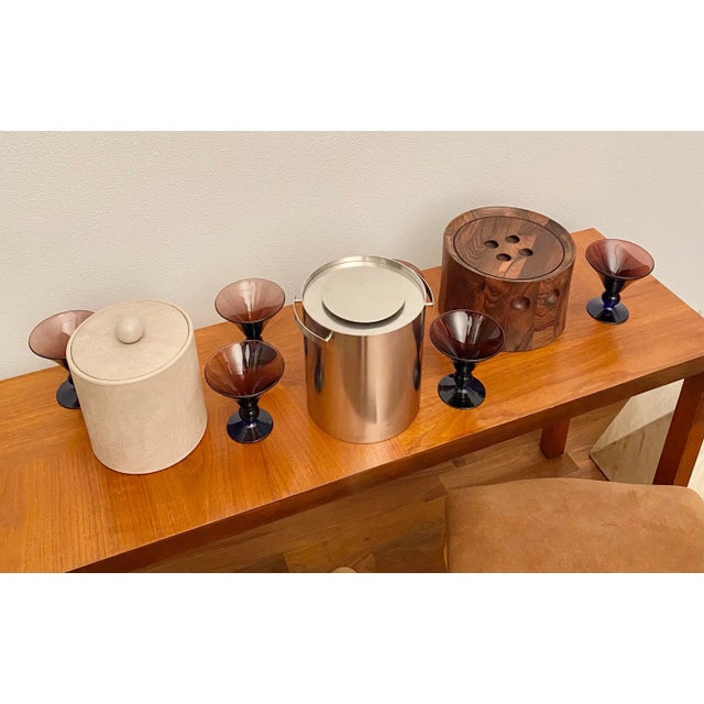 Staved rosewood ice bucket designed by Richard Nissen for his own company Nissen in Denmark during the 1960s. The lid and...