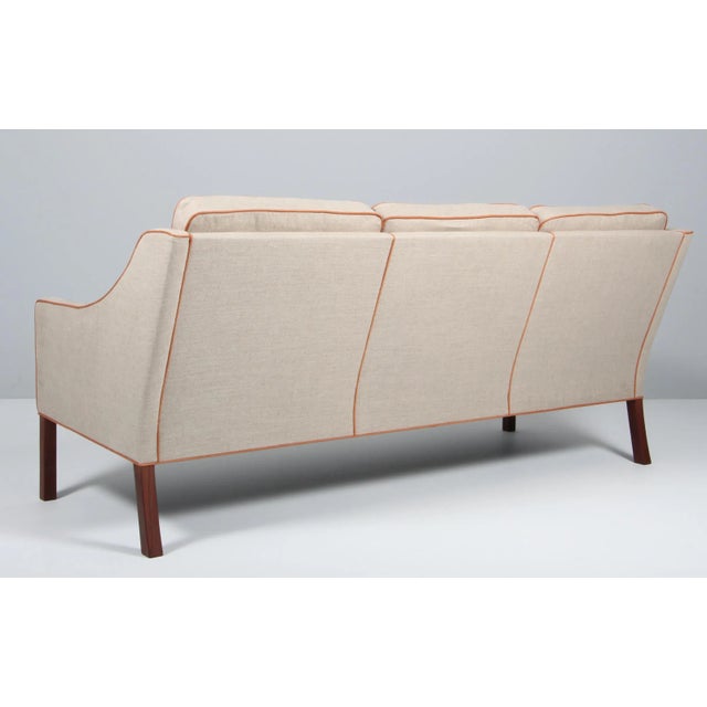 Børge Mogensen three-seat sofa new upholstered with canvas and tan aniline leather Legs of mahogany. Model 2209, made by...