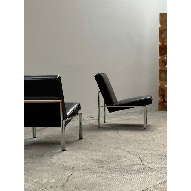 Set of 2 very exclusive and rare 1960s Bauhaus armchairs, featuring thick black leather and a chrome tubular steel frame....