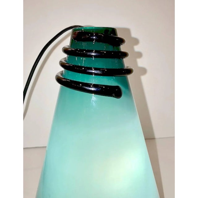 A signed VeArt Venezia green over white case glass with black accent cone vase or table lamp from 1983 in the Menphis style.
