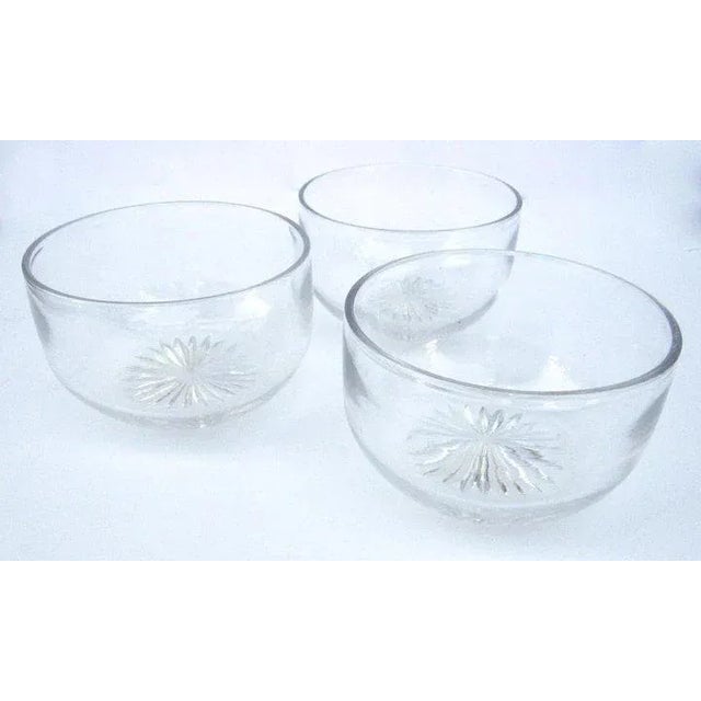 Set of 3 etched glass finger bowls, 19th Century. Each measures 2 1/2 X 4 1/4 inches. Good condition. Container A