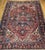 "This exceptional late 19th-century Persian Heriz Serapi rug from Northwest Persia. The rug features a deep, dark red...