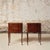 Add refined elegance to your space with this set of two early 21st century French walnut bedside tables, beautifully...