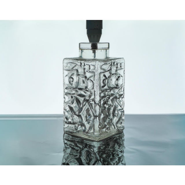 A striking vintage Scandinavian glass table lamp base designed by Henrik Blomqvist for Stilarmatur (Tranås Armatur),...