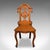 This is an antique reception hall chair. A Scottish, golden oak side or occasional seat, dating to the early Victorian...