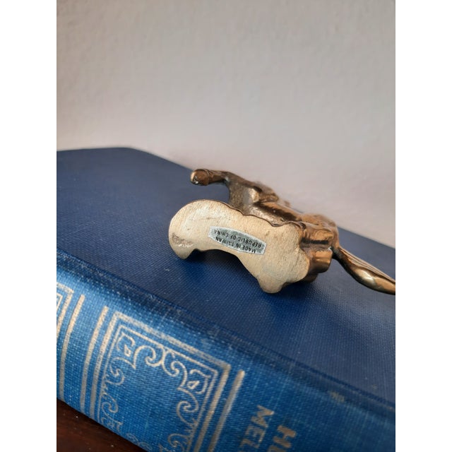 Cute little touch of whimsical in this mini brass unicorn. A bit of brass magic!