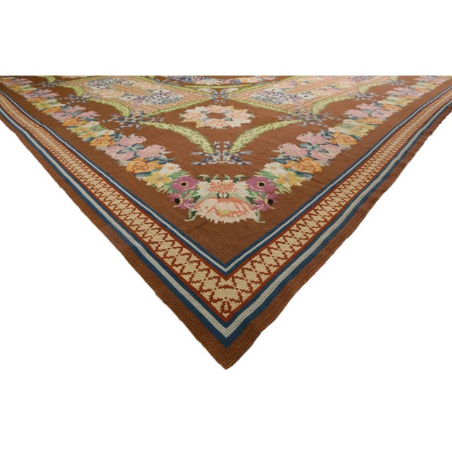 77321 Antique Portuguese Arraiolos Rug, 16'03 x 21'05. French Romanticism meets Maximalism in this oversized antique...