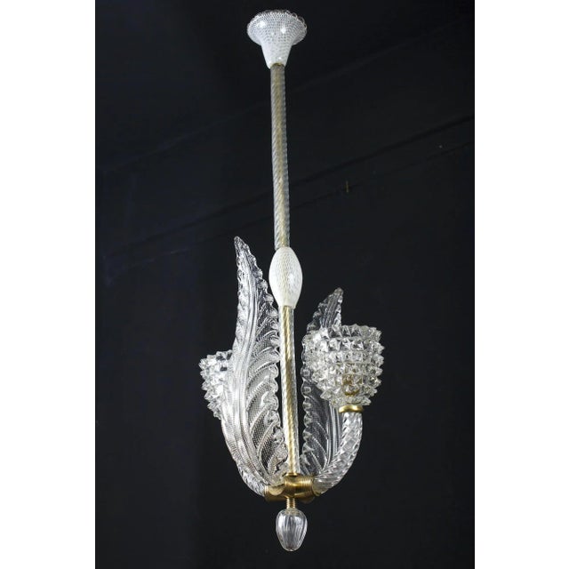 Piece of great elegance designed by ercole barovier. Two fine rostrato handblown bowl surrounded by two amazing leaves....