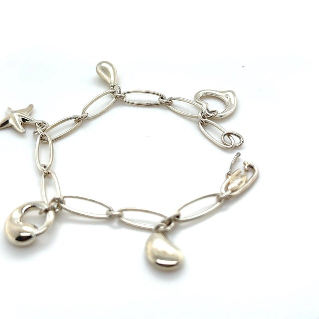 Tiffany and Co. Tiffany & Co. Sterling Silver Elsa Peretti Five-Charm Bracelet 17.08g For Sale - Image 4 of 7