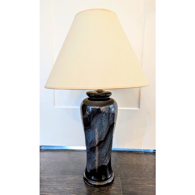 A beautiful, ceramic table lamp glazed in gloriously inky hues of navy, indigo and deepest purple. This raku-style vintage...